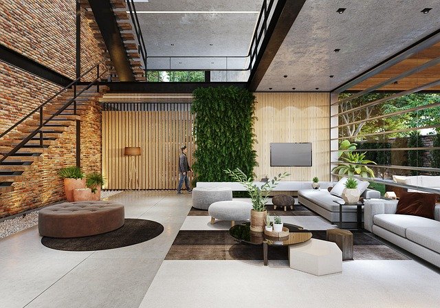 área privativa Na imagem, um loft com uma sala ampla e uma escada levando a um mesanino. Pela janela é possível ver uma área verde e uma varanda. Nesse tidpo de construção com poucas paredes, é mais fácil determinar a área privativa.